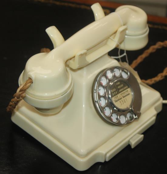 An ivory Bakelite 232L pyramid telephone,